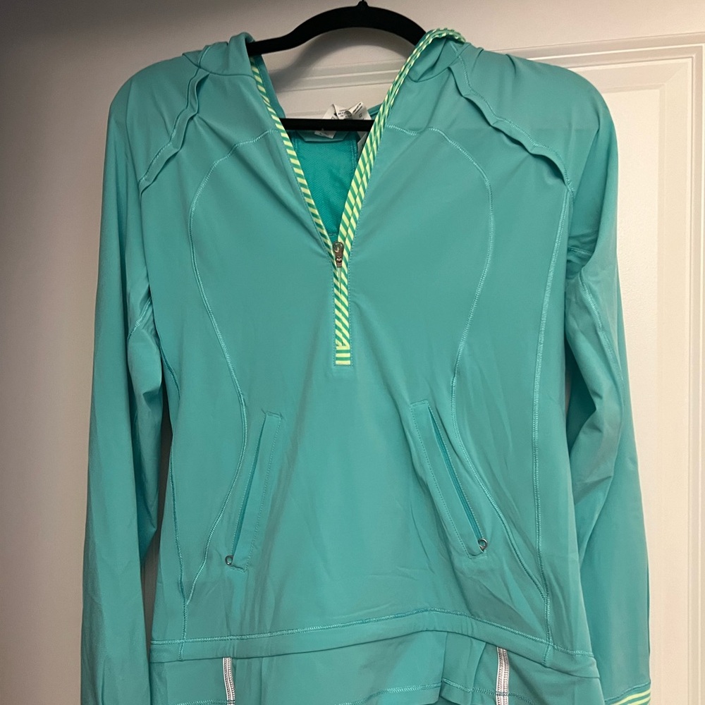 Lulelemon Athletica pullover hoodie with half zip. New without tags. Size 4.